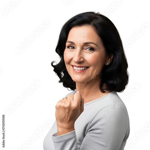 Confident woman celebrating success with a triumphant fist pump pose