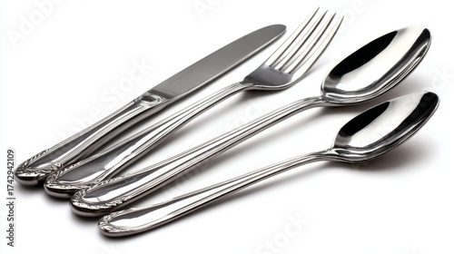 a set of silverware, including forks, knives, and spoons, arranged neatly in a row on a white surface
