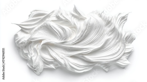 a large white foam object with smooth curves that resemble a swirl or vortex pattern. the texture appears to be textured like whipped cream
