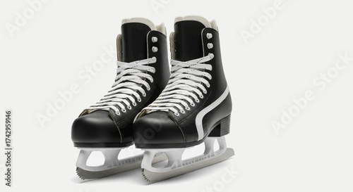 Ice skates, a classic symbol of winter sports and recreational activity, ready for a day on the ice rink