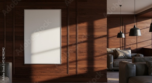 A modern living room with dark wood paneling and contemporary furniture showcasing art.
