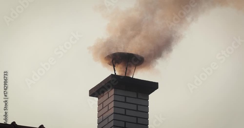 Smoking Chimney on a Roof
