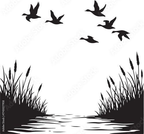 Black silhouette flock of ducks flying over water and reeds