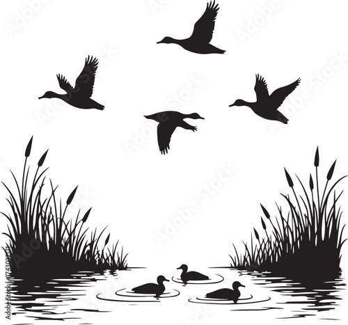 Black silhouettes of ducks flying over water with reeds