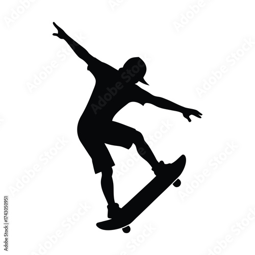 Black silhouette of a young male skateboarder executing a dynamic trick with arms outstretched for balance.