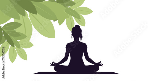 A silhouette of a person meditating peacefully under the shade of lush green leaves.