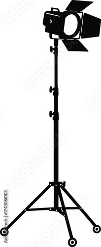 Studio light icon, photography equipment silhouette, tripod with wheels, barn doors, film lighting gear, black graphic, media production tool