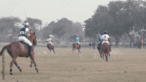 Horse Polo match. Men on horses playing polo.