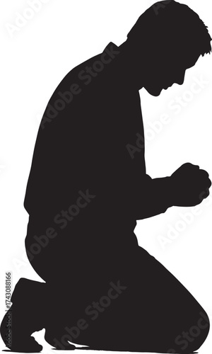 Silhouette of a man kneeling in prayer or supplication