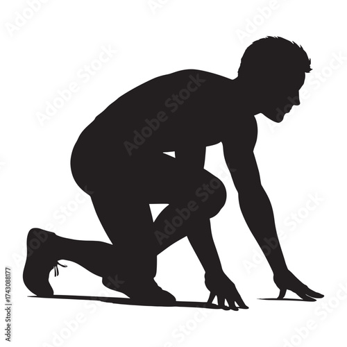 Silhouette of a sprinter at the starting line ready to race