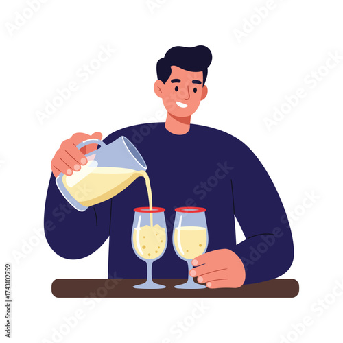 Smiling man pouring a yellow beverage from a pitcher into two glasses with red rims on a table.