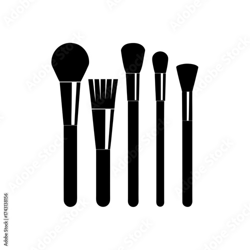 Five makeup brushes in black on transparent background