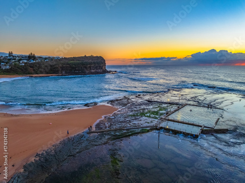 Sunrise at the beach with low cloud bank