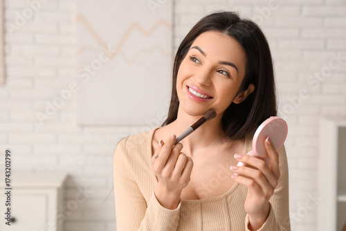 Beautiful young woman with ...