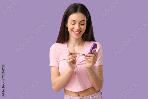 Beautiful young woman with ...
