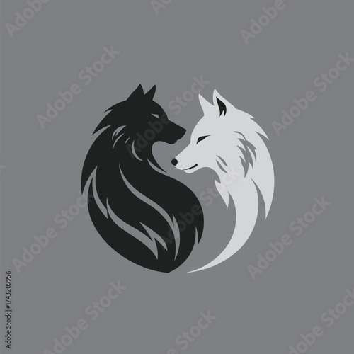 Two wolves, one black and one white, are positioned to form a yin-yang symbol. The design represents balance and the connection between opposing forces.