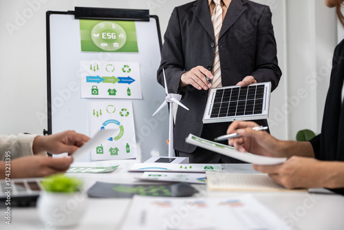 Renewable energy presentation corporate office business meeting professional environment close-up view sustainability concepts