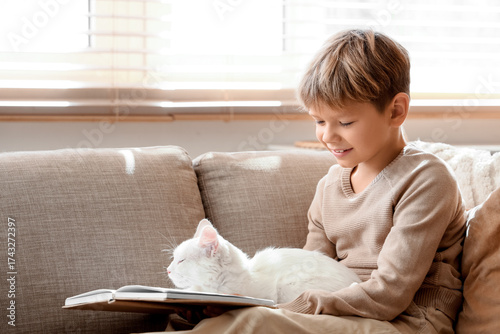 Cute little boy with white ...