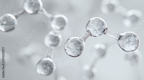 Close-up of transparent molecular structure with spherical nodes and connecting rods, resembling a chemical compound.