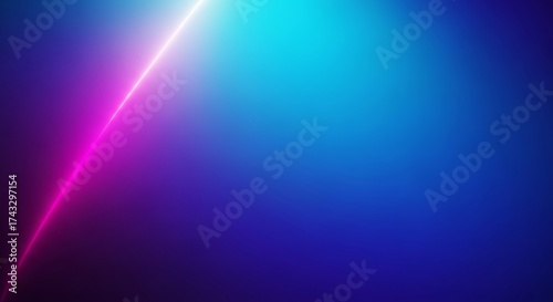 A vibrant pink laser beam illuminating a gradient of blue and purple hues