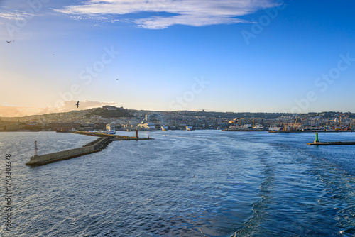 Cityscape of Naples with the port and Mount Vesuvius, southern Italy.