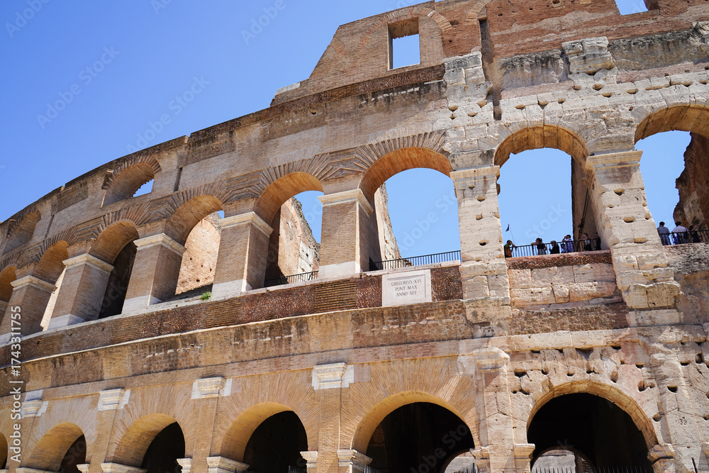 Obraz premium Arches, new and old, at the Roman Colosseum