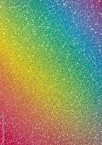 Vibrant, full-spectrum rainbow gradient abstract background made from thousands of sparkling glitter particles