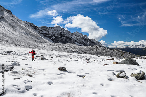 Hiking on snow in the Central Alps, Valmalenco, Lombardy, Italy landscape