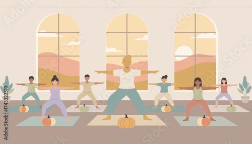 Diverse group practicing yoga in a bright studio embracing wellness and autumn vibes