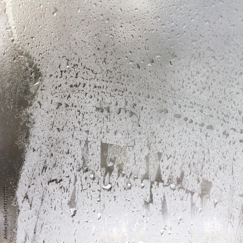 Frozen Drops on Frosted Glass. Winter Textured Background.