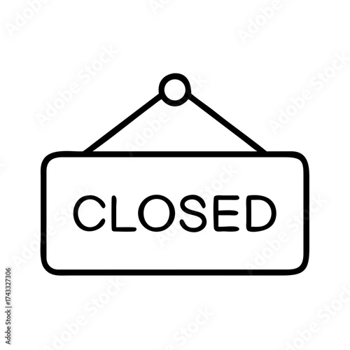 Closed sign hanging on door in minimalistic design  