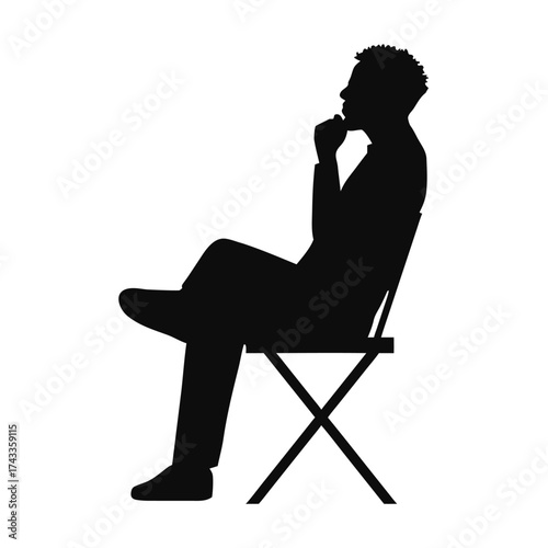 Thoughtful Man Sitting on a Chair Silhouette