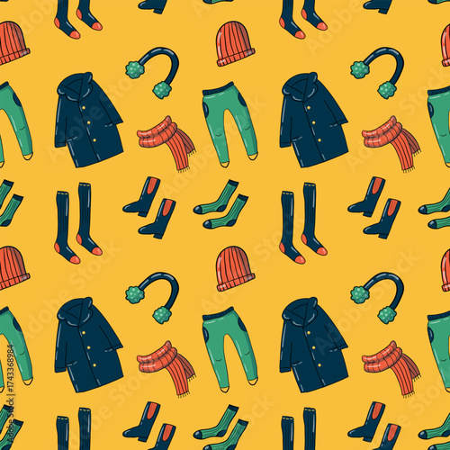 Set of warm clothing in doodle style, seamless pattern, hand-drawn illustration. Playful elements, Bright palette, joyful yellow background. Perfect for cozy autumn and winter seasonal projects.