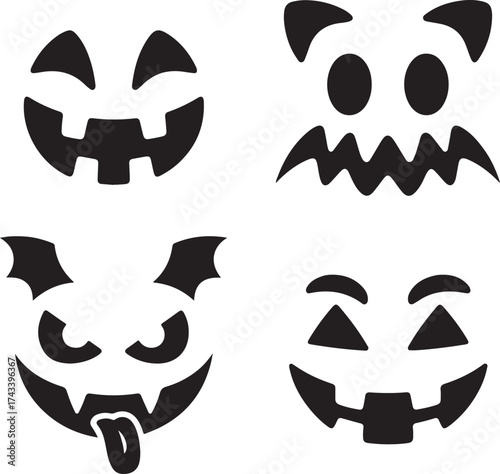 Four spooky halloween pumpkin faces carved with different expressions and designs