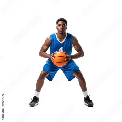 Young African American basketball player in blue uniform holding a basketball.