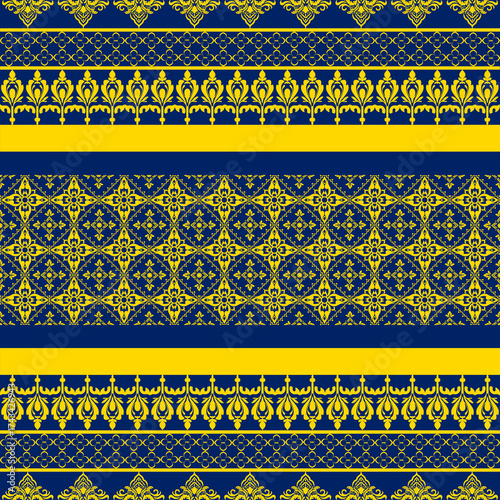 Intricate golden Thai damask pattern on dark blue background, showcasing Thai artistry and elegance. Ideal for packaging, wallpaper, luxury branding, and creative design inspired by Thai tradition.