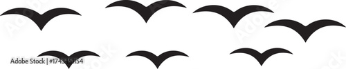 Flock of stylized black birds in silhouette flying in formation Keywords: birds, flock, flying, flight, migration, sky, nature, wildlife, animals, silhouette, black, white background, graphic
