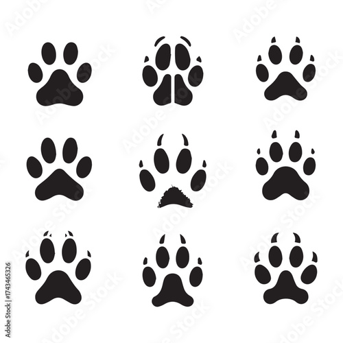 Collection of nine black animal paw print icons on a white background animal track footprint