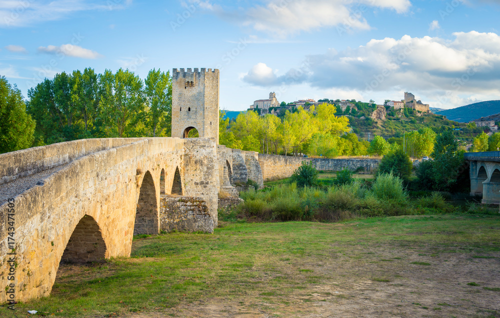 Fototapeta premium View at Puente medieval de Frias. Medieval bridge near the town, crossing the Ebro river.