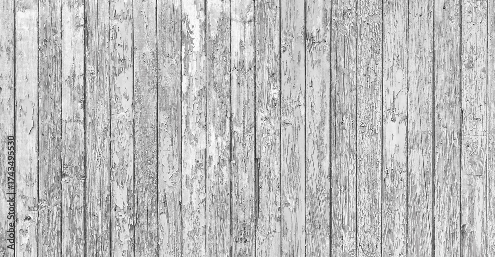 Naklejka premium cracked paint flakes peel off on old wooden fence background