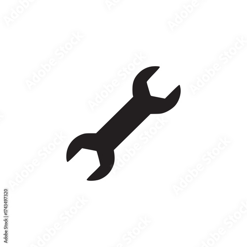 A simple black silhouette of a wrench tool isolated on a white background for construction or repair work