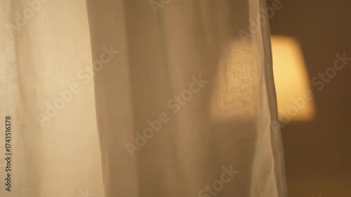 Intimate Evening Ambiance with a Warm Glowing Lamp in a Softly Blurred Room