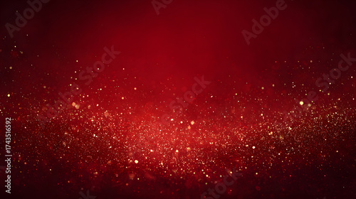 Sparkling golden particles dance across a rich, deep red background for festive celebrations