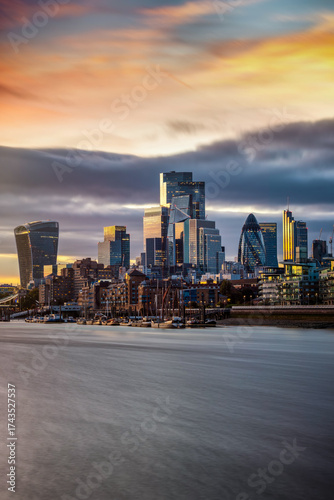 Long exposure view of the skyline of the City of London, England, during a moody autumn sunset