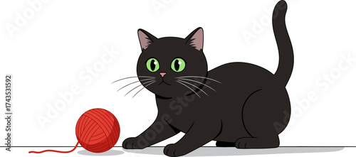 Adorable black kitten with bright green eyes sitting next to a red yarn ball on a dark background