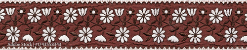 Brown embroidered horizontal canvas with white flowers
