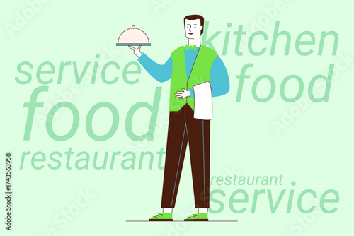 Waiter standing in restaurant, holding covered dish. He wearing green vest and showing friendly demeanor. Food-related text in background