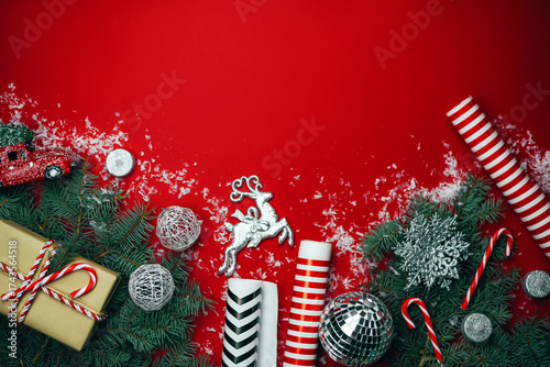 Christmas composition with gifts on a red background.