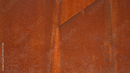 Grunge industrial rusty orange brown geometric metal corten steel wall background texture banner