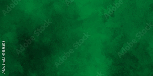 Deep emerald watercolor splash forming a vibrant and textured green abstract background,Dark green watercolor. Emerald green color. Vivid textured aquarelle painted art design background.